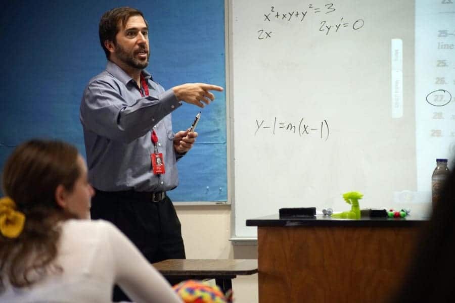 Innovative math classroom at Albuquerque Academy with engaging teacher and students.