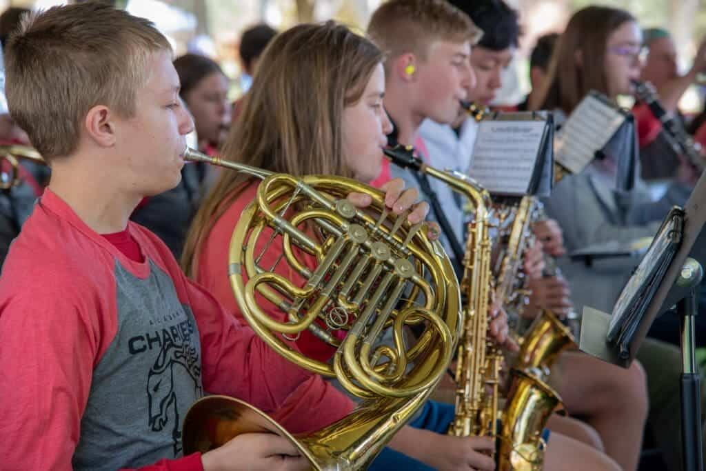 Students playing musical instruments at Albuquerque Academy campus.