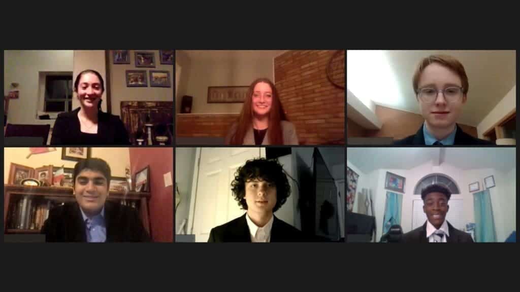 Diverse students participating in virtual class at Albuquerque Academy, innovative education scene.