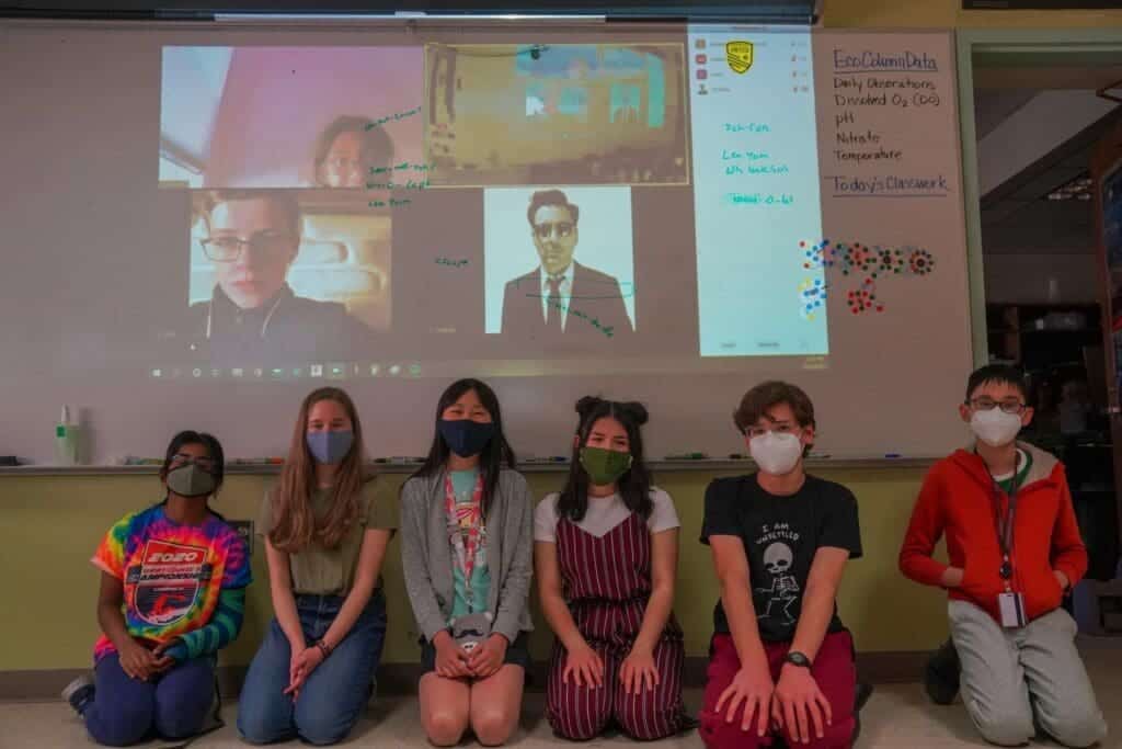 Students participating in a virtual classroom activity at Albuquerque Academy, emphasizing STEM education and technology.