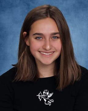 Smiling female student at Albuquerque Academy in a professional school portrait.