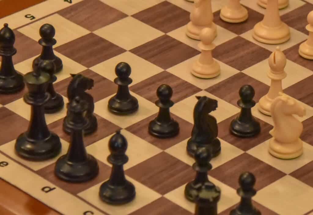 Chess game on a wooden board at Albuquerque Academy.
