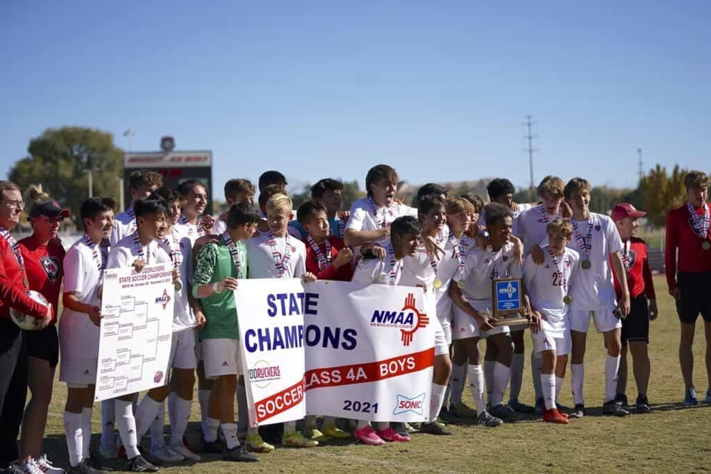 Victory celebration of Albuquerque Academy's soccer team winning state championship.