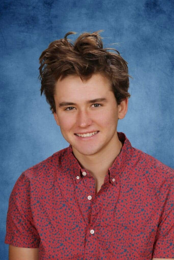 Young male student smiling, Albuquerque Academy, private high school in Albuquerque NM, American education, student portrait.