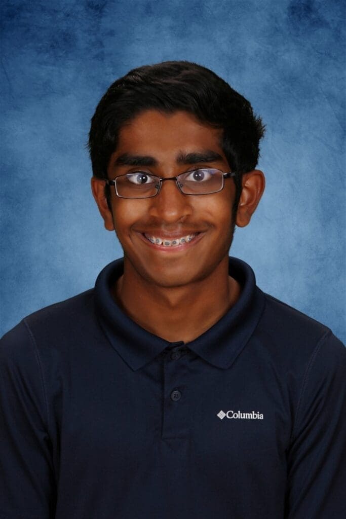 Young student smiling at Albuquerque Academy, private high school in New Mexico.