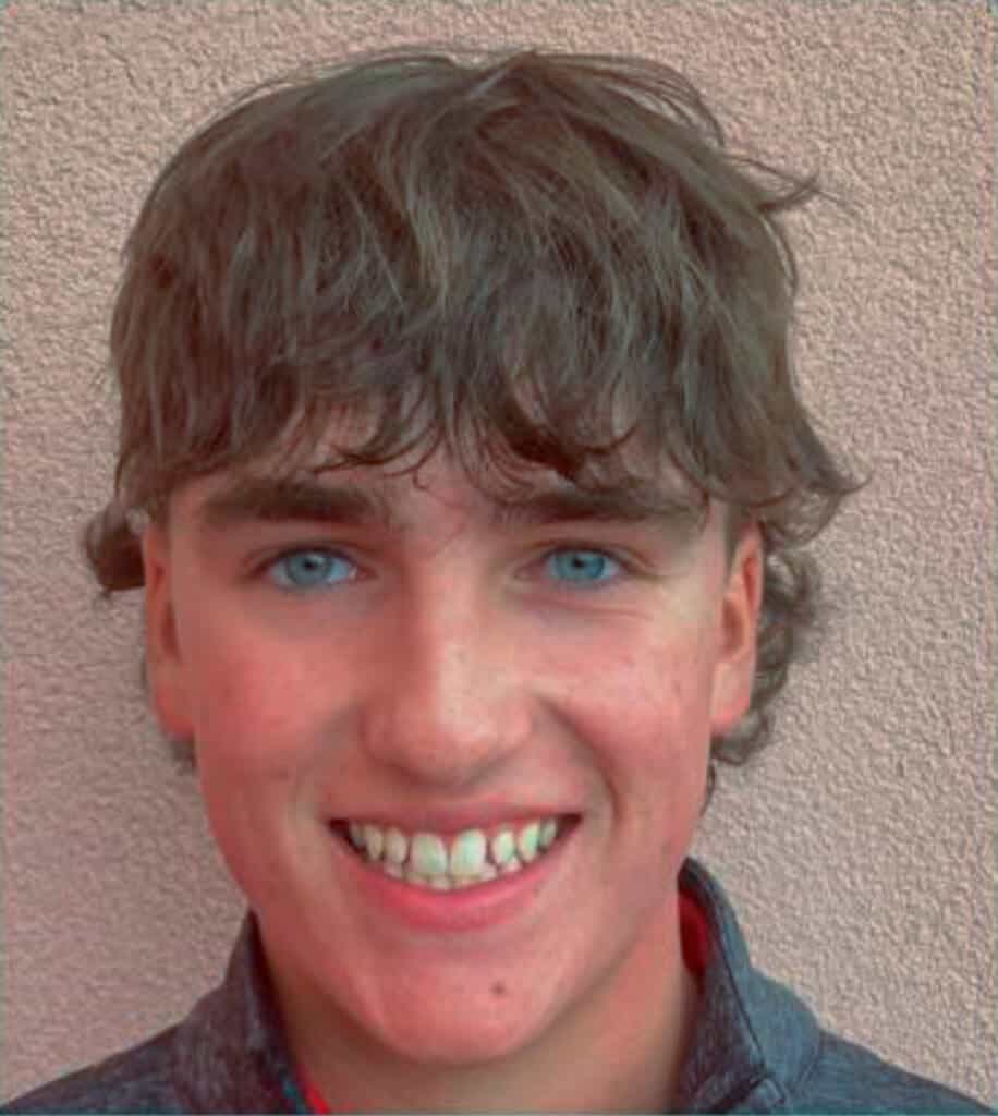 Bright young student with blue eyes at Albuquerque Academy campus.