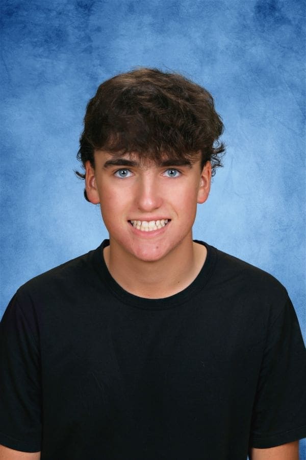 Bright young male student at Albuquerque Academy school portrait.