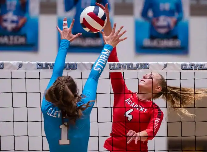 Youth volleyball game at Albuquerque Academy sports complex.