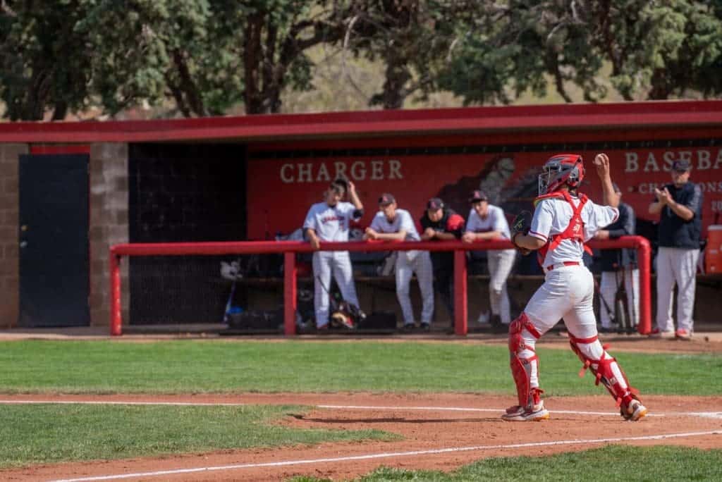 Youth baseball game at Albuquerque Academy sports facility.