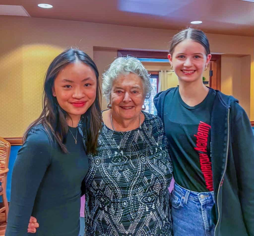 Albuquerque Academy students and teacher bond during school event.