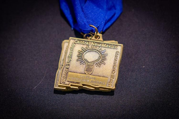 Medal showcasing Albuquerque Academy’s focus on science and leadership excellence.