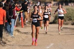 High school cross country race at Albuquerque Academy with student athletes competing.