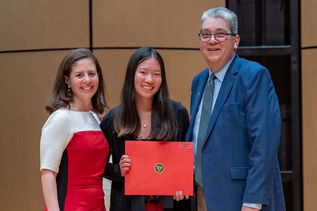 Outstanding student receiving academic recognition at Albuquerque Academy graduation ceremony.