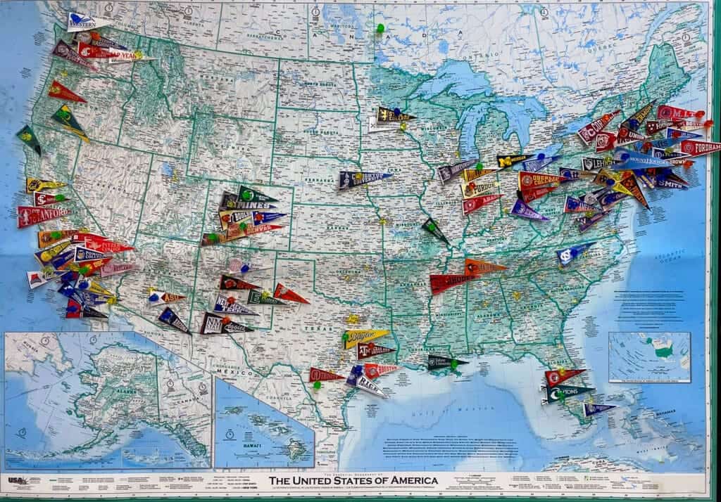 Albuquerque Academy on a map with college flags across the United States, showcasing educational excellence and university connections.
