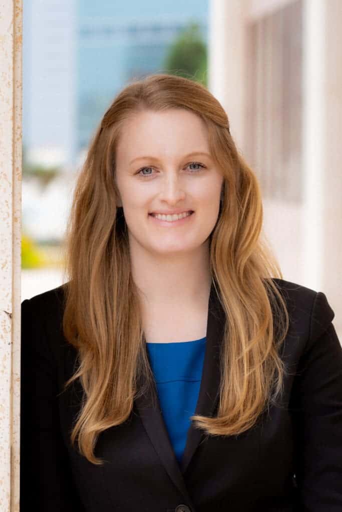 Albuquerque Academy student portrait, smiling young woman in professional attire.