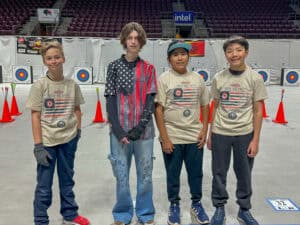 Young archers from Albuquerque Academy at a national archery tournament.