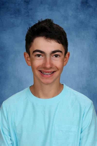 Albuquerque Academy eighth grader smiling, celebrating second place at State Spelling Bee.
