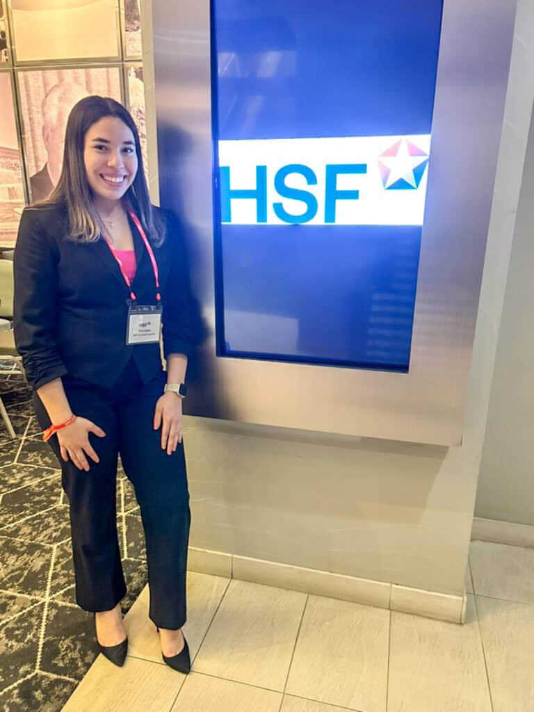 Albuquerque Academy student at UNM Regents Scholarship event with HSF logo.
