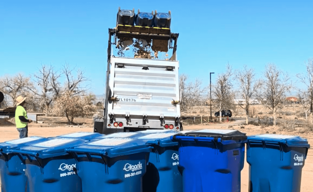 Albuquerque Academy recycling truck composting campus waste into soil for sustainability.