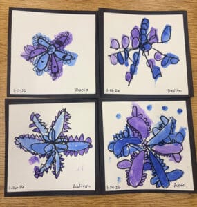 Four blue and purple abstract student watercolor artworks