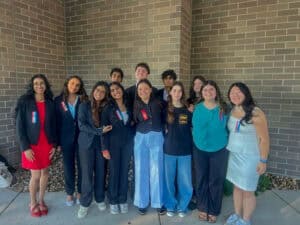 Group of students at Albuquerque Academy during a speech and debate event.
