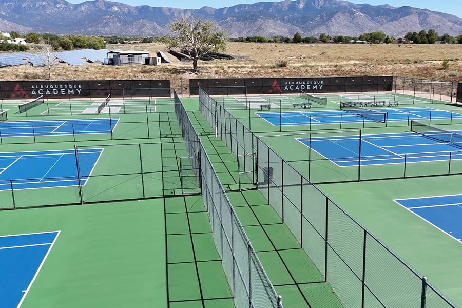 Albuquerque Academy tennis courts with mountain view in the background.