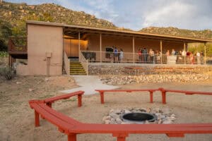 People gather at Albuquerque Academy's outdoor pavilion during renovations at Bear Canyon Recreation.