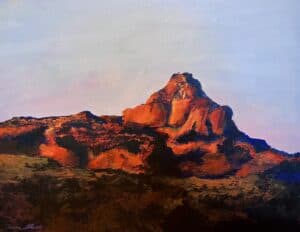 Painting of a rugged mountain landscape with warm sunset colors.